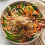Chopsticks pickup up japchae.