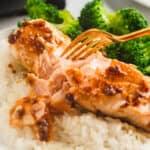 Eating miso butter salmon with rice and broccoli.