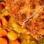 Japanese curry with potatoes and carrots with crispy tonkatsu.