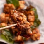 Crispy air fryer Taiwanese popcorn chicken on a skewer.
