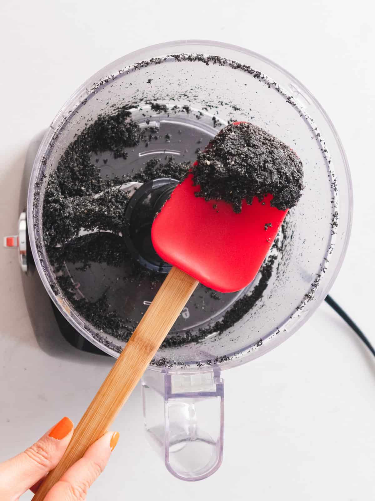 Ground black sesame paste in a food processor.